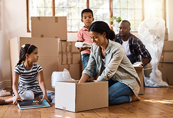 children helping with a move